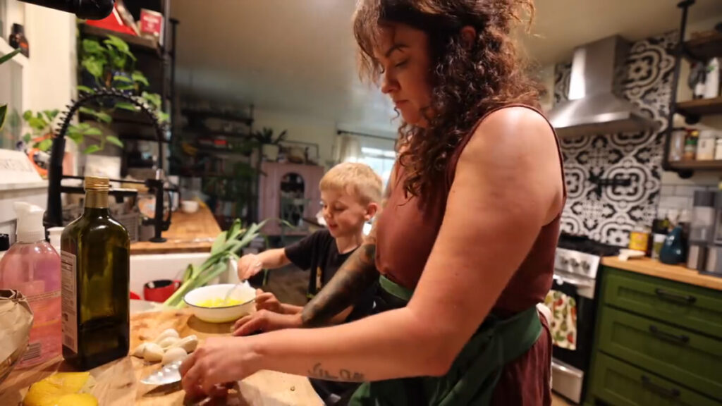 Mother and son cooking in the kitchen.