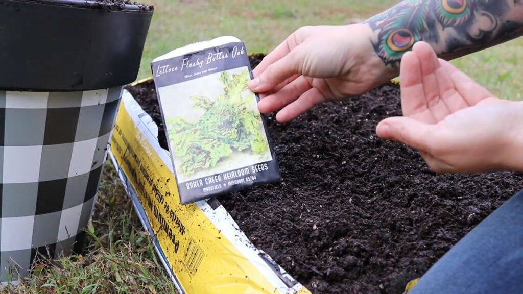 Image of a bag of potting soil and a seed packet.