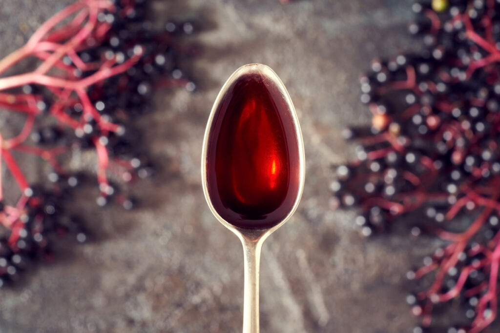 Elderberry Syrup on a spoon.