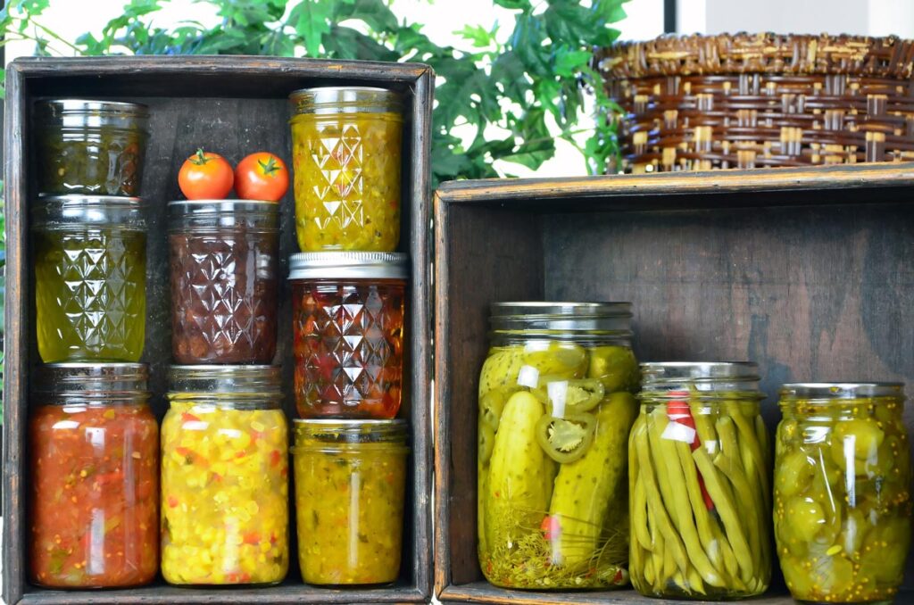 Various jars of home canned food on display.