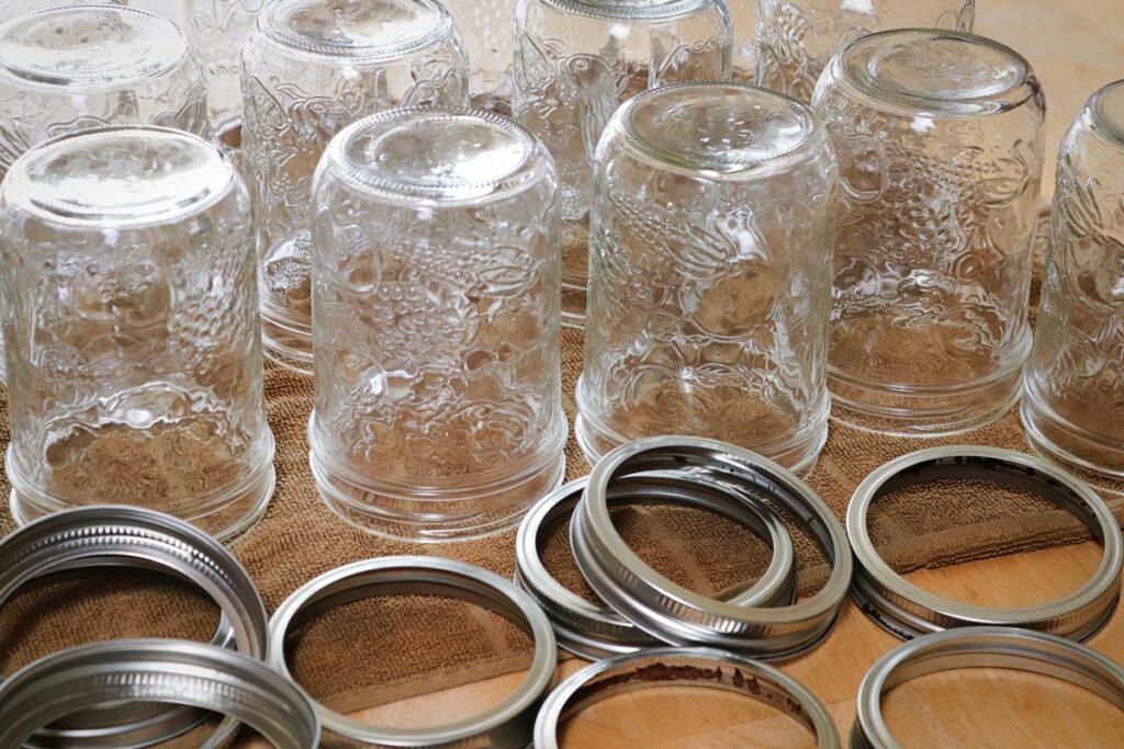 Empty Mason jars turned upside down to dry.