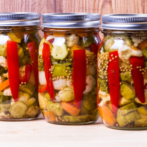 Three jars of quick pickled vegetables.